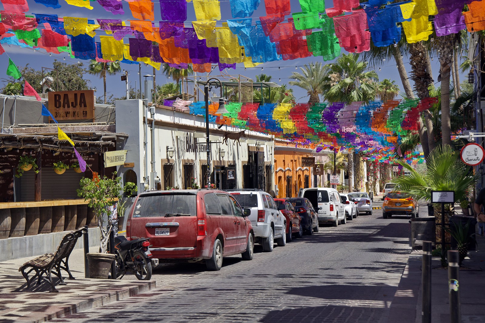Colourful flags above Calle Jose Maria Morelos