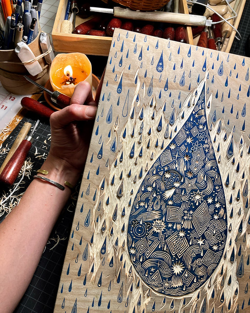 Finished carving center💧; working now on all the 💦  #wip #woodcarving #birchplywood #woodcut