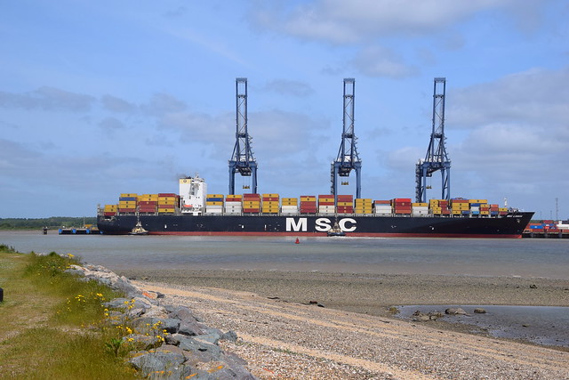 MSC Lisbon, being berthed on Trinity No.7, after arriving from Antwerp. Svitzer Shotley aft and Kent mid ship working hard against the blustery wind to keep her against the quay. Felixstowe 29 05 2023