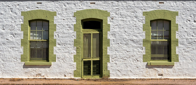 Two windows and a door