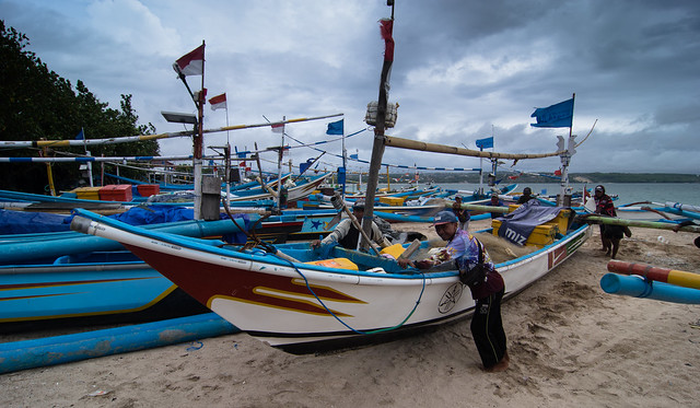 Bali - Pushing Boat on the Beach