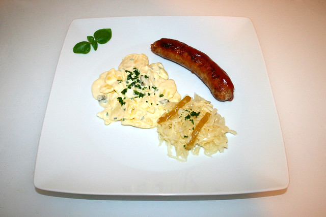 Bratwurst with two salads - Served / Bratwurst mit zwei Salaten - Serviert