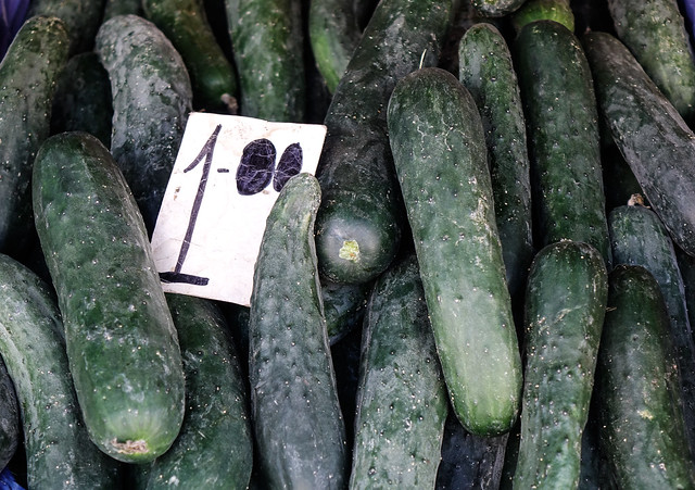 Fresh green cucumber for sale at street market