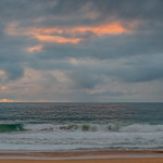 6. Juuni 2023 - 6:47 - Rain and an overcast sunrise by the seaside from Killcare Beach on the Central Coast, NSW, Australia.