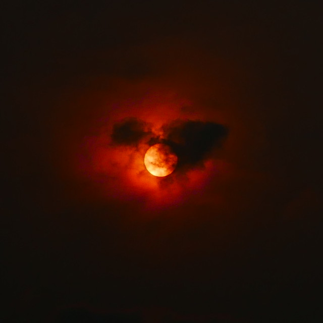 Dark cloud and red sun, about 6:34 pm