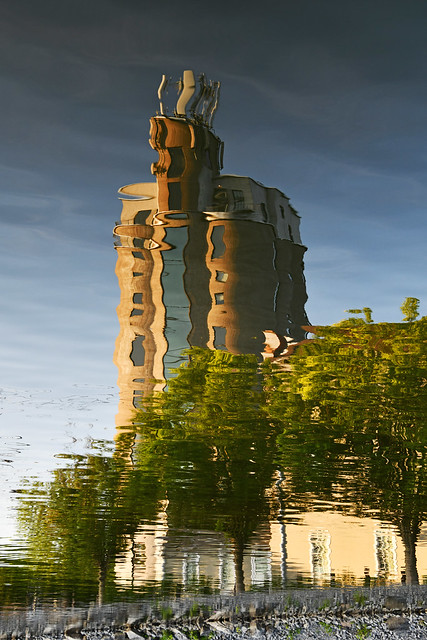 Reflection of a former grain elevator (now offices) along the Erie Canal