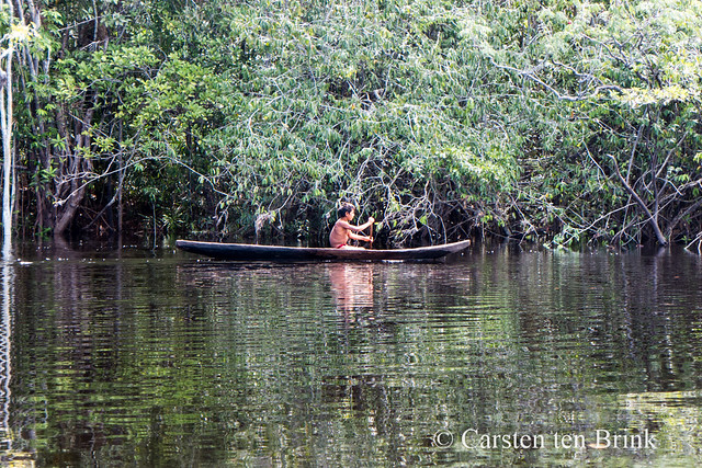 Yanomami child in canoe [bc2361e]