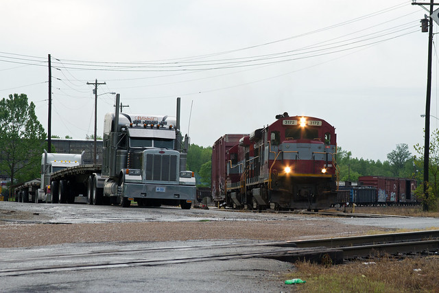 Trucks-N-Trains. Peterbuilts and GE B23-7s work side by side in Tennessee