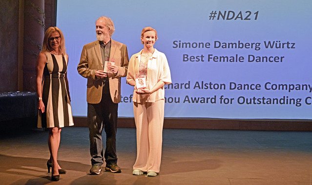 Amanda Hill presents winning trophies to Richard Alston and Simone Damburg Wurtz (from the 2021 awards)