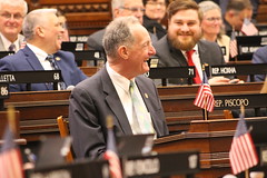Rep, Piscopo begins House Session with a smile.