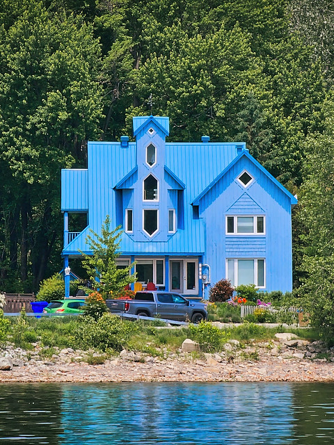 Blue house on the side of the Outaouais River - FlickFriday Blue Theme