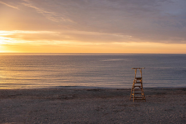 Lifeguard chair at sunrise