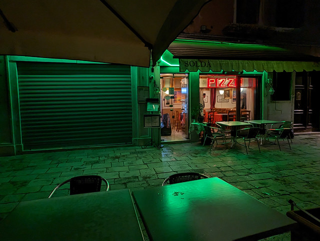 Pizza Restaurant With  Green Light