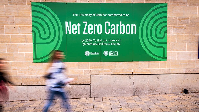 Campus net zero sign stating: 'The University of Bath has committed to be Net Zero Carbon by 2040. To find out more visit go.bath.ac.uk/climate-change'