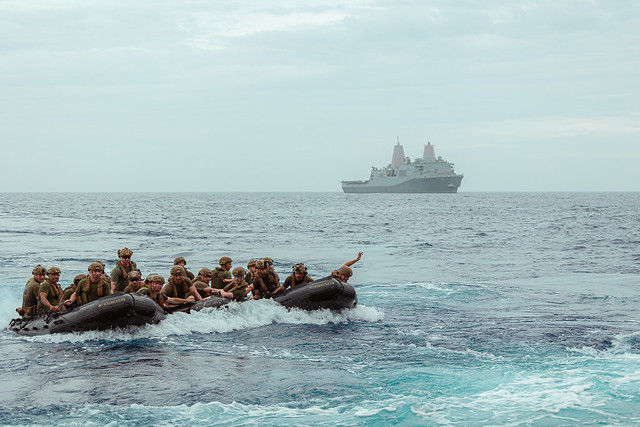 U.S. Marines prepare to board USS Green Bay during a launch and recovery exercise