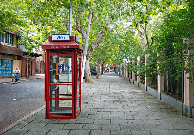 China 2015. Shanghai. Old telephone box in the French concession.