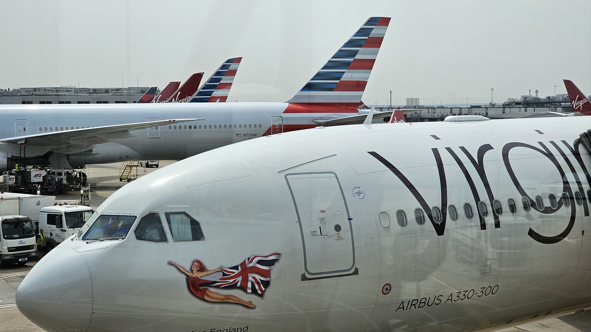 Virgin and AA aircraft at Heathrow T3