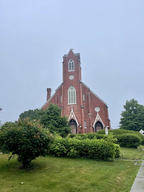 St. Mary’s Catholic Church (former). 44 Fairfield Street. St. Albans, Vermont. Built in 1849 using the Gothic Revival Style. Contributing Building to the NRHP District.