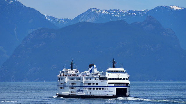 Queen of Surrey en route from Horseshoe Bay to Langdale with Anvil Island, Howe Sound, for a backdrop - 12 June 2023 [© WCK-JST]