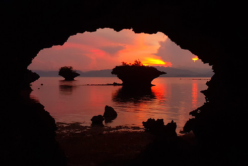 Mushroom rocks sunset by Chris Chafer, Taken through hole-in-the-rock
Moalboal, Cebu Island, Philippines