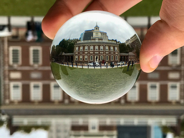 Independence Hall in a glass ball lensball in Philadelphia Pennsylvania