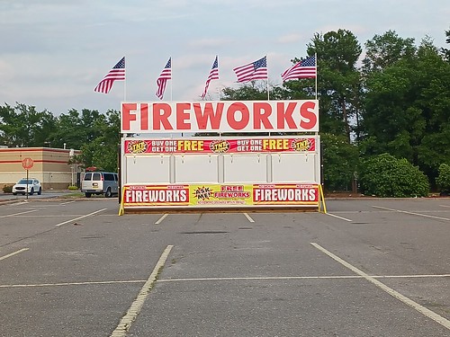 Fireworks I took one last picture in Hope Mills. Fourth of July is coming. That means Fireworks for sale in Wal*Mart parking lots across America. This is at the Wal*Mart Supercenter on Main Street in Hope Mills, North Carolina in Cumberland County.
