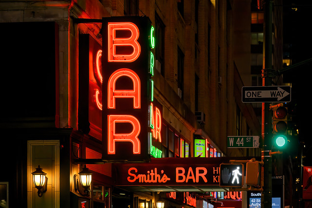 Neon signage at Smith's Bar and Restaurant on 44th Street and Ninth Avenue at night, Manhattan