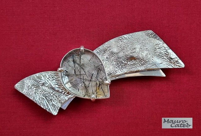 Reticulated silver brooch