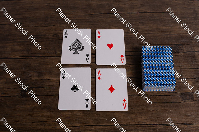 Four aces playing cards. Four playing cards of the same rank.   - Stock photo with image ID: be137afc-8c81-4d3c-93dd-c12f8400ebce