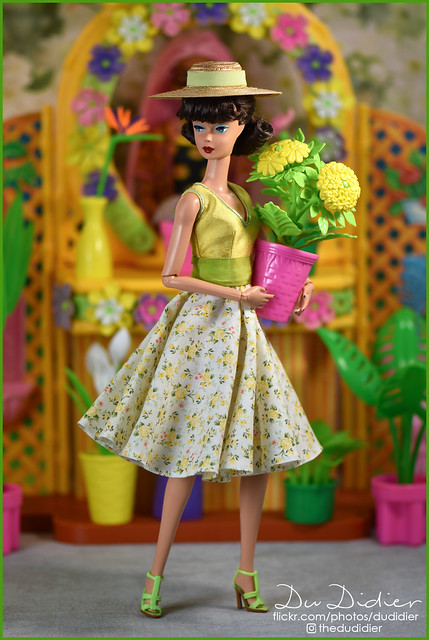Barbie bought herself flowers at the Tropical Flower Shop.