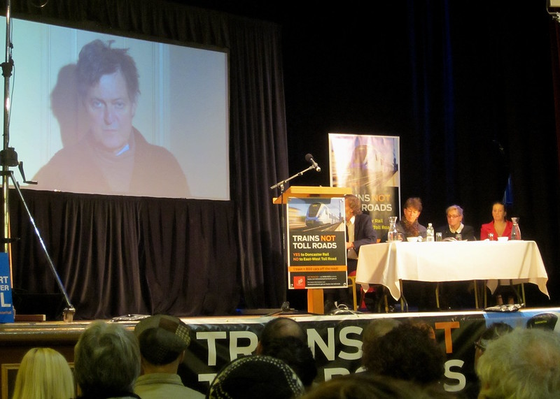 Paul Mees speaks via video at the Trains Not Tollroads meeting, 13 June 2013