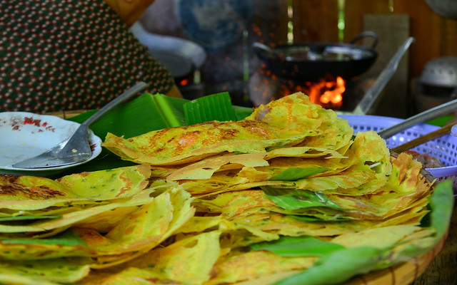 Making pancakes (banh xeo) in Southern Vietnam