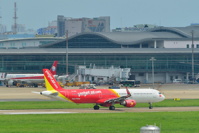 Passenger airplane landing at the airport