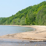 The Beach at Cut River's Mouth We made it to the bottom of the Cut River&#039;s valley. That&#039;s Lake Michigan on the left, and the mouth of the river in the foreground.