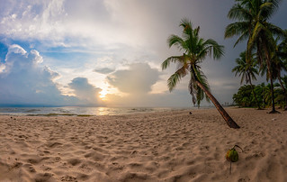 Panorama beach with palm tree in front of the Centara Hotel in Hua Hin during the rainy season