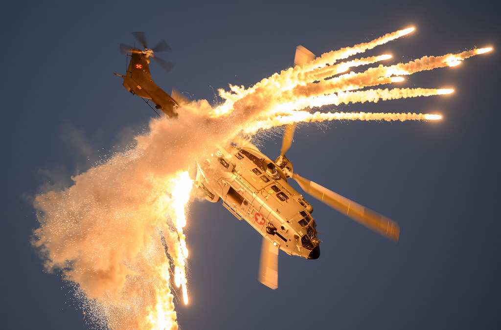 Eurocopter AS332 Super Puma dropping flares - Swiss Air Force
