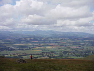 Backview towards Lake District, with walker in picture SWC Walk 414 - Cross Fell and Great Dun Fell (Langwathby to Appleby)