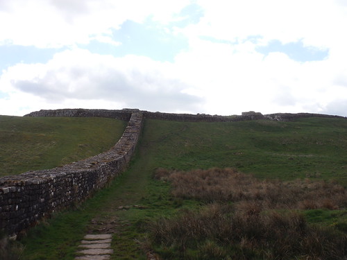 Backview to Housesteads Fort from Knag Burn Gate SWC Walk 413 - Hadrian's Wall Path Core Section (Lanercost to Halton Chesters)