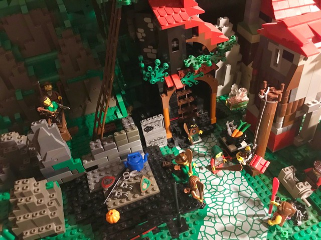 LEGO Classic Castle: Henricus Captured by the Forestmen and taken to the torture Forest cave dungeon as a Pinjata being bashed up