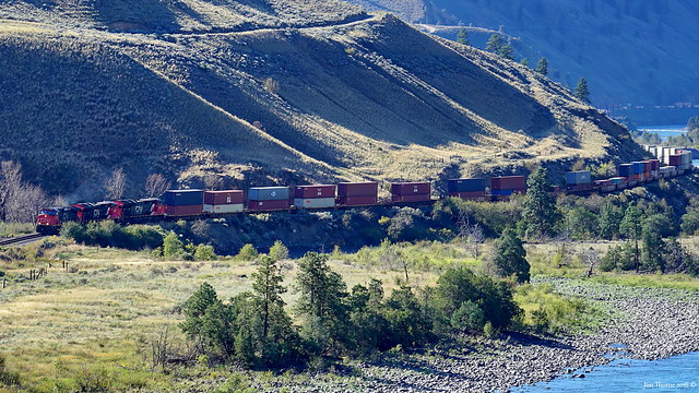 CN 2717 along with a pair of 3000 series units leads a long east bound stack train over CP's Thompson Sub just east of Spences Bridge in BC's Thompson Canyon - 12 September 2016 [© WCK-JST]