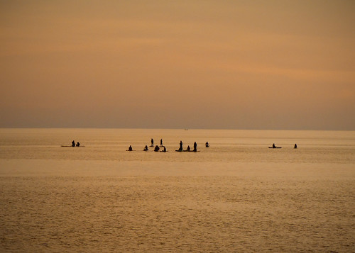 sunset sea horizon paddleboarders tourism malaysia borneo kotakinabalu silhouette