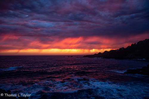 Sunset colors at Stillwater Cove by aquathom, This was a spectacular sunset with a line of rain clouds that blew into the coast right at sundown. 