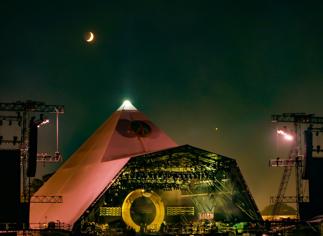 Venus and the crescent moon with Earthshine over Glastonbury's Pyramid stage in 2023