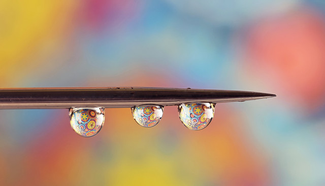 Three colorful droplets