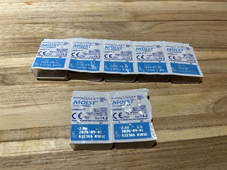 A photo of a package of seven contact lens