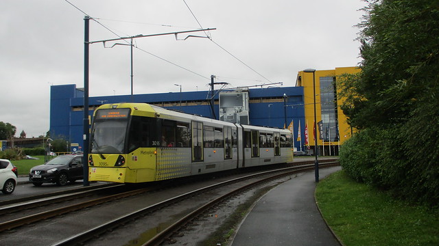 Manchester Metrolink 3095 tram passing IKEA Store in Ashton-under-Lyne