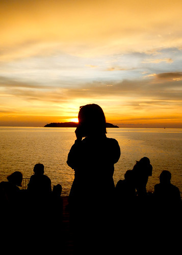 tourism silhouette sunset holidaymakers holiday borneo malaysia