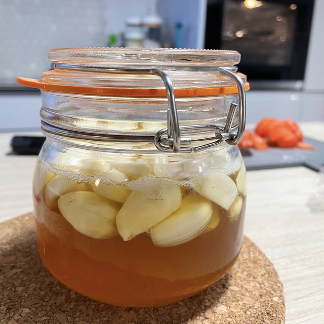 Garlic, fermenting in honey.