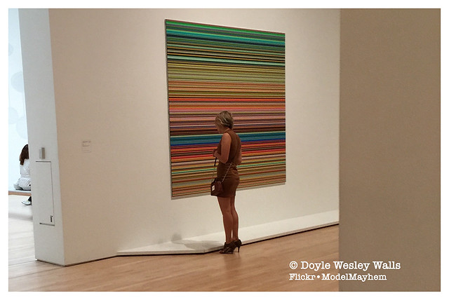 Woman Getting a Closer Look at a Painting by Gerhard Richter at SFMOMA