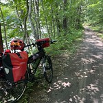 Shaded gravel trail alongside the West River on a hot summer afternoon, north of Brattleboro VT 